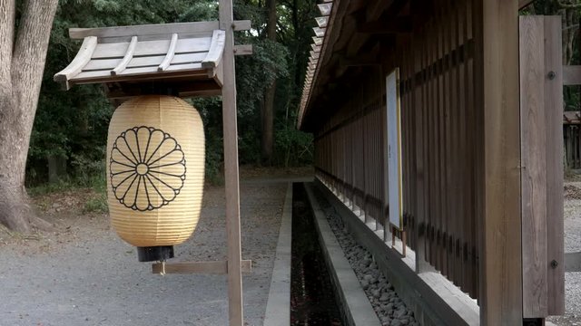 a paper lantern at meiji jingu shrine in tokyo, japan