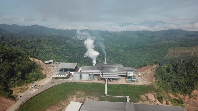 Aerial drone footage of palm oil refinery in Borneo, Malaysia. Palm oil is used to make biofuel.
