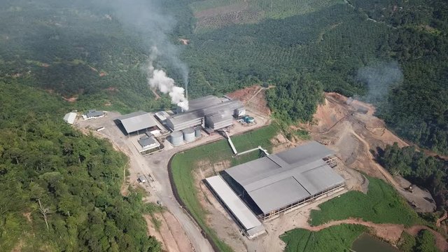 Aerial drone footage of palm oil refinery in Borneo, Malaysia. Palm oil is used to make biofuel.