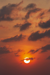 Set big sun red orange and black clouds