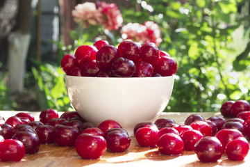 Cherry. Many cherry berries. Cherries in a plate