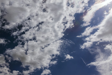 White clouds in a blue sky