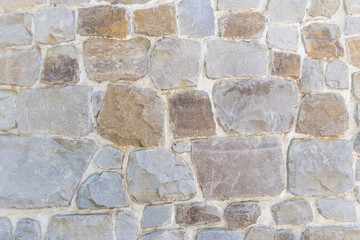 Wall from different stones, background, texture
