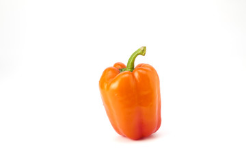 Orange bell pepper on white background