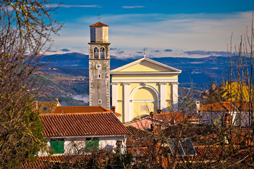 Town of Vizinada church and skyline above istrian landscape view