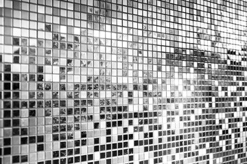 Perspective of silver square mosaic tiles for texture background