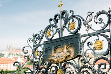 Prague, Charles bridge - Bas-relief depicting a monk John of Nepomuk