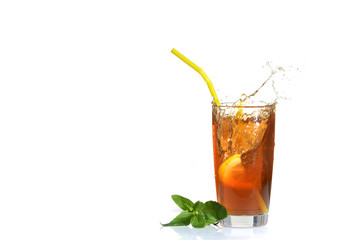 Splashes of iced tea from lemon slice on white isolated background.