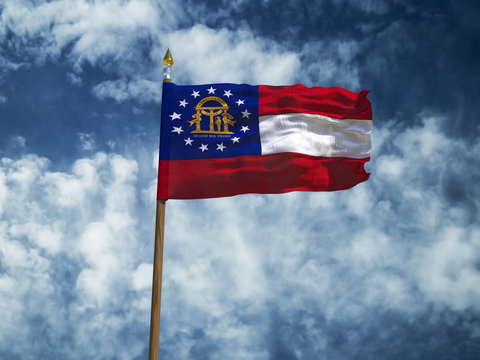 Georgia flag USA flag Silk waving flag made transparent fabric of Georgia US state with wooden flagpole gold spear on background sunny blue sky white smoke clouds real retro photo 3d illustration