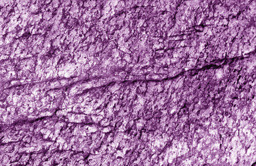 Old stone texture in purple tone.