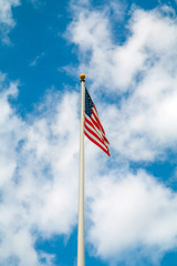 American flag blowing in the wind.