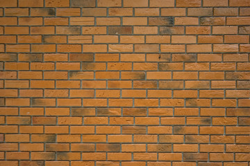 Empty brick wall. House wall under construction with red bricks, seamless background photo texture.