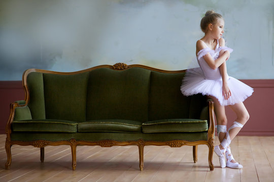 Little girl ballerina in white tutu