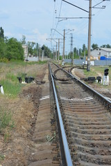 Railway track with branching and white marking in front of it