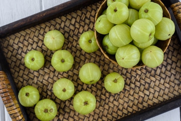 Indian gooseberry on wooden table