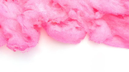 Close up of pink cotton candy on a white background. - 209316590