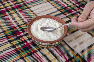 Traditional bulgarian yogurt in a traditional bowl