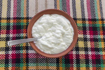Traditional bulgarian yogurt in a traditional bowl