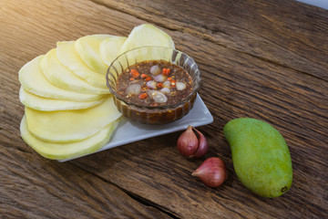 Raw mangoes sour with Sweet fish sauce