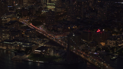 Fototapeta na wymiar AERIAL: Famous busy Brooklyn Bridge interchange overpass at evening rush hour