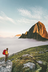 Lost in mountains traveler exploring alone hiking with backpack adventure traveling lifestyle...