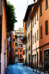 Fototapeta na wymiar BOLOGNA, ITALY - May 27, 2018: Street view of Buildings around Bologna, Italy