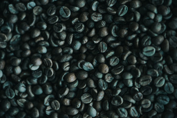 Close-up view of roasted natural coffee beans texture