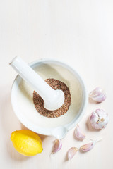 Differen dry seeds for a folk medicine on white background