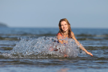 young slender girl in bikini