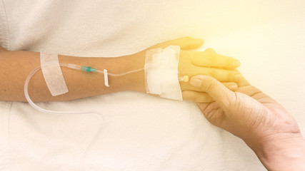 patients on the bed have injecition saline