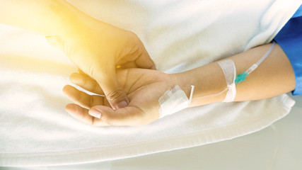 patients on the bed have injecition saline