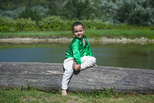 Little boy child dressed in the clothing culture of India.