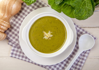 Spinach cream soup in bowl