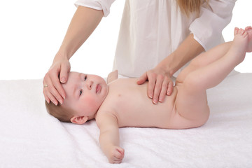 Fototapeta na wymiar mom doing massage baby on white background