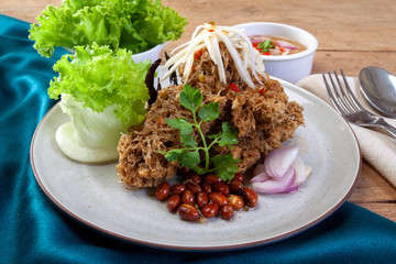 Crispy catfish salad with green mango