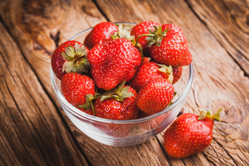 Fresh nice strawberries on wooden table.