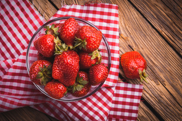 Fresh nice strawberries on wooden table.