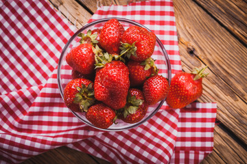 Fresh nice strawberries on wooden table.