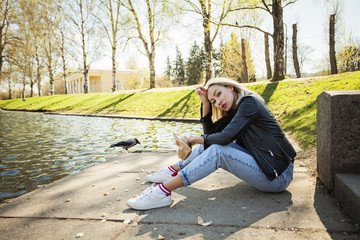 Fototapeta premium Tired woman relaxing outdoors in park