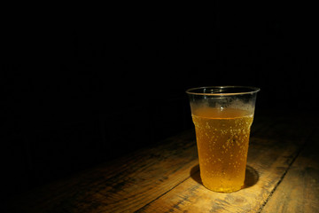 Cold Beer Glass on Old Wood Table