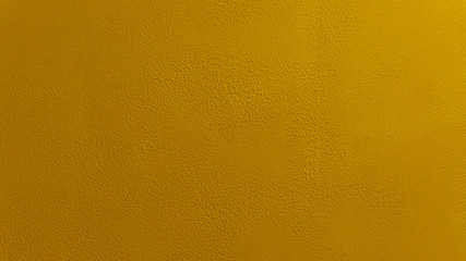 Yellow gold textured wall background
