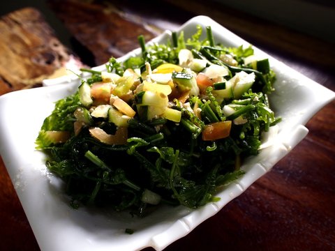 Plate of Pako Salad or Fiddlehead Fern Salad