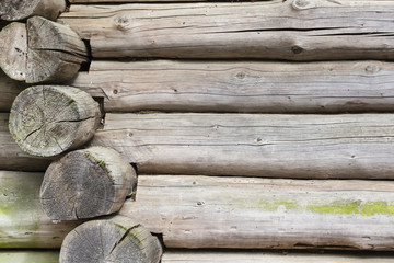 Wooden logs wall of rural house background.