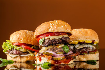 Close-up of homemade American hamburgers, burgers. The concept of European street food. The background image. Copy space