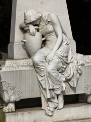 Cemetery sculpture grieving woman with vase