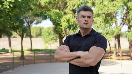Fototapeta premium Muscle sexy young man. Young attractive man in urban background