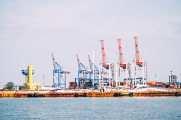 Cargo crane, ship and grain dryer in port Odessa, Ukraine