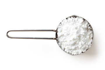 Powder sugar on white background, from above