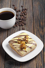 Square donut with glaze and coffee