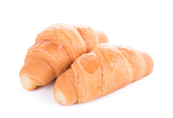Two croissants on a white background.
